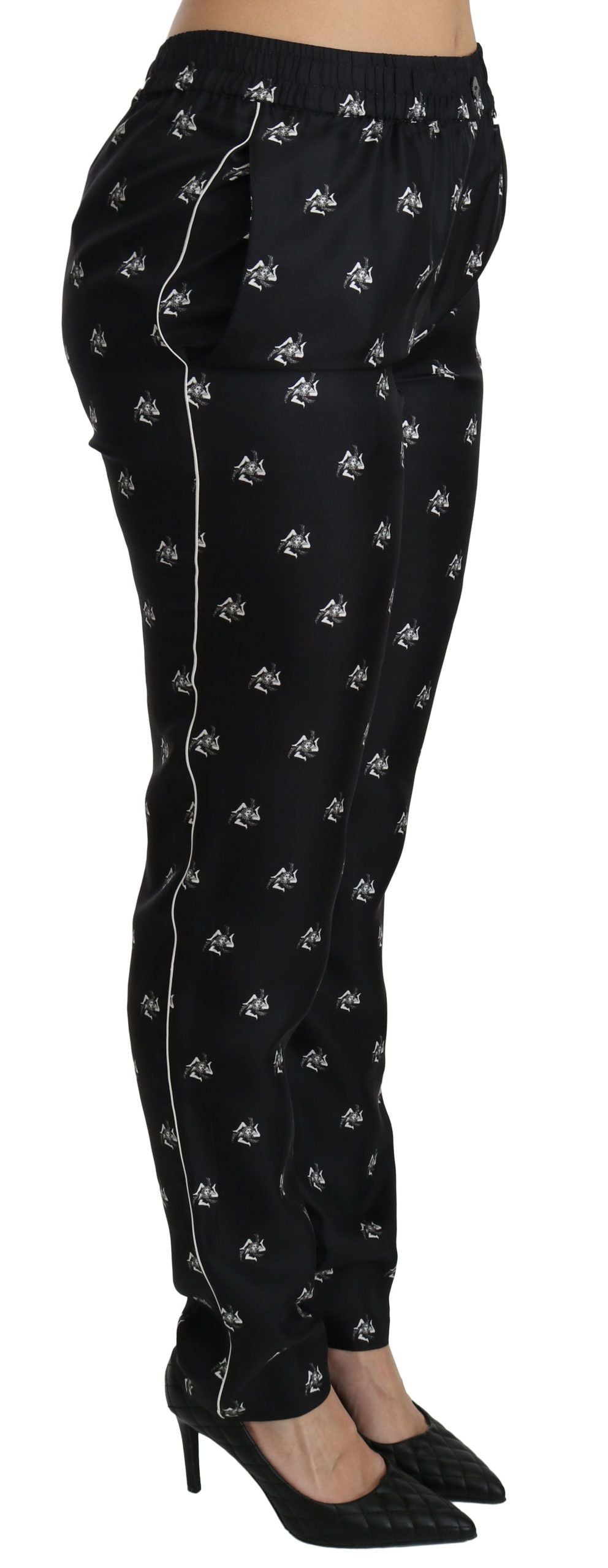Pantalones ajustados de seda con cintura media y estampado negro