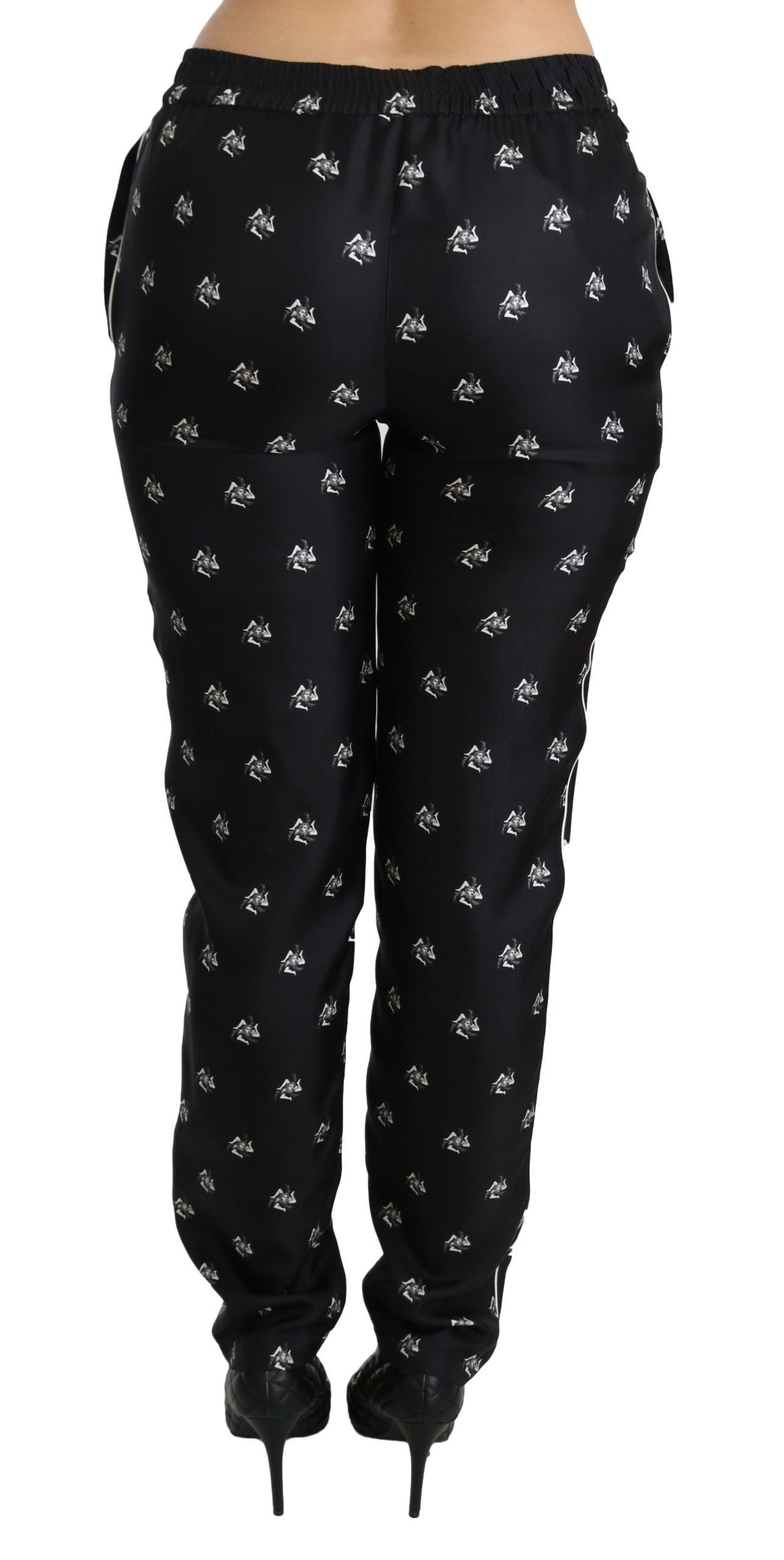 Pantalones ajustados de seda con cintura media y estampado negro