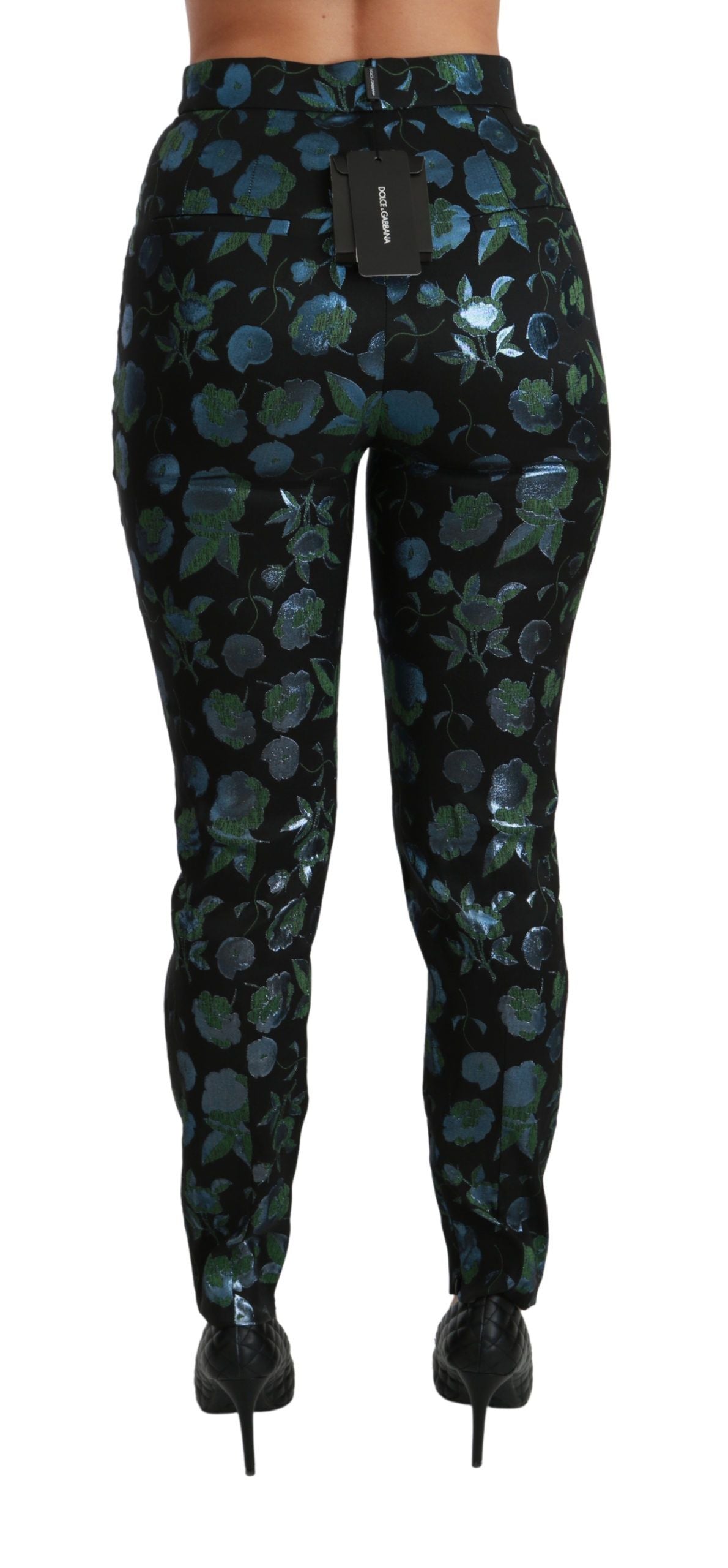 Pantalones ajustados metalizados con estampado floral azul verdoso