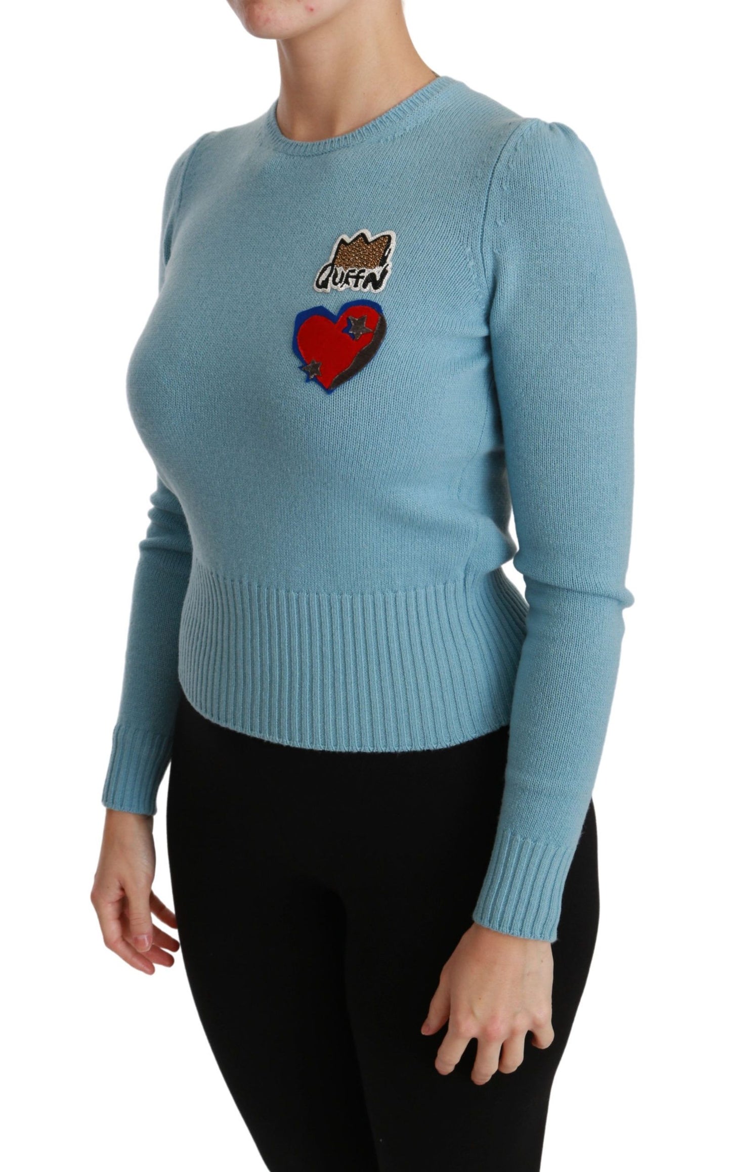 Suéter de lana azul con estampado de corazones de la reina