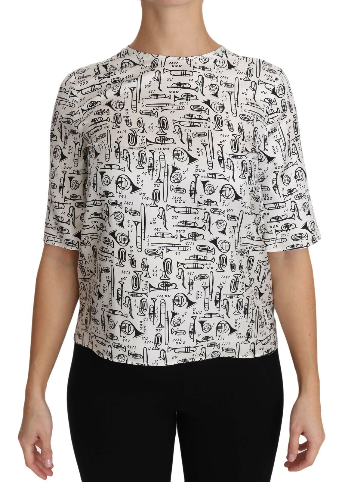 Blusa blanca con estampado de instrumentos musicales