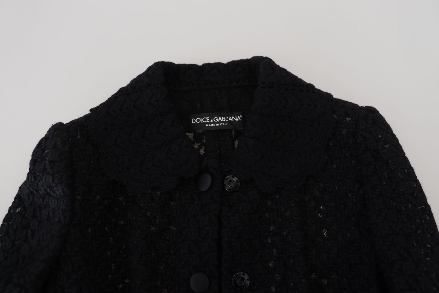Chaqueta de punto de lana negra con cuello abotonado