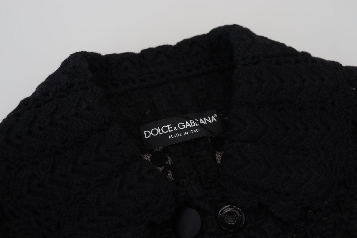 Chaqueta de punto de lana negra con cuello abotonado