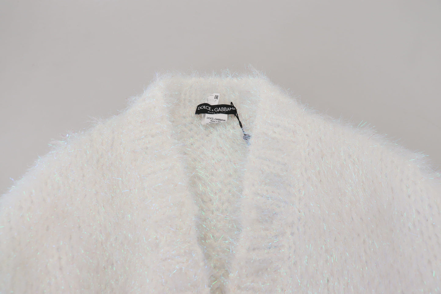 Chaqueta tipo cárdigan blanca de manga larga con flecos