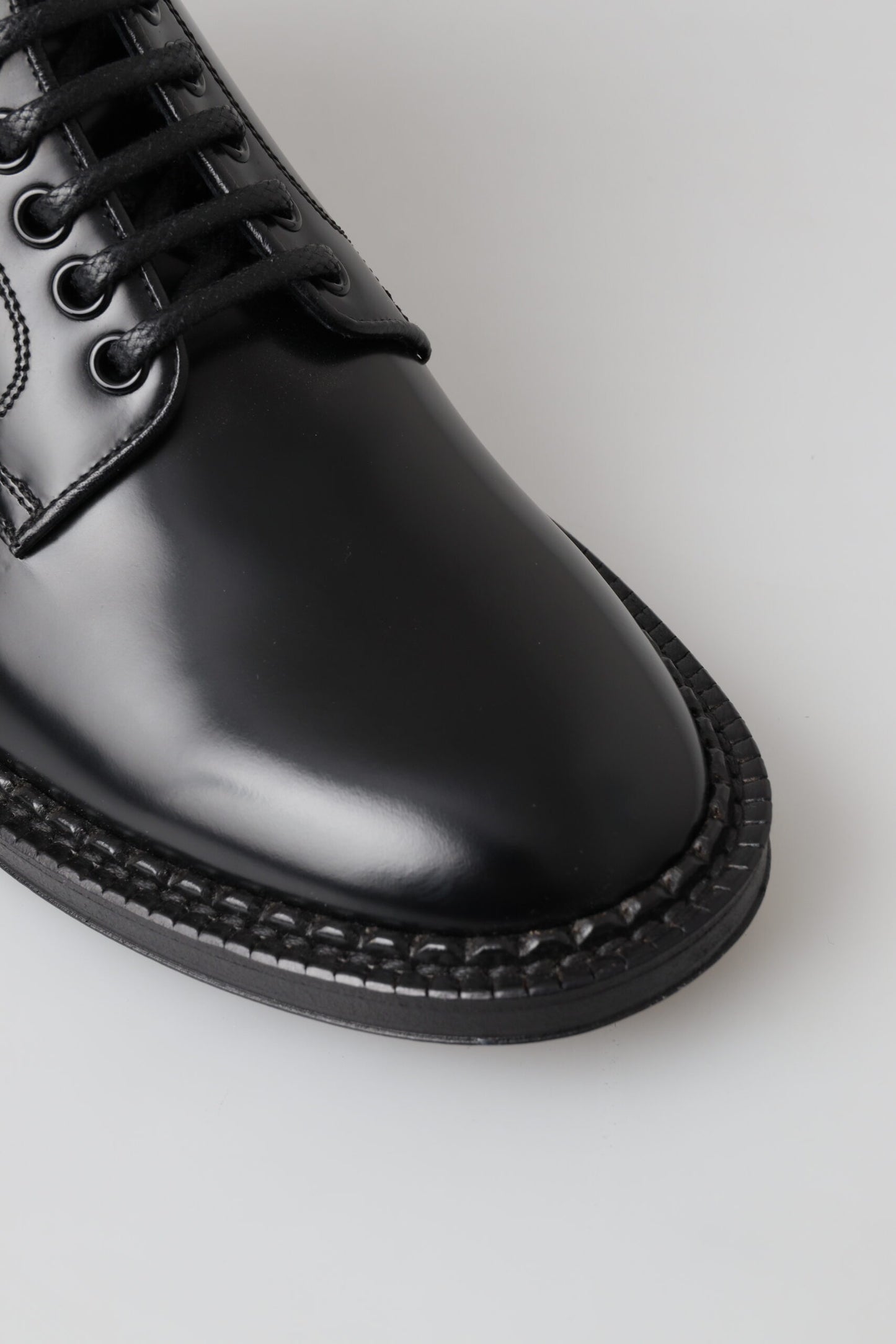 Botas cortas de cuero negro para hombre con cordones
