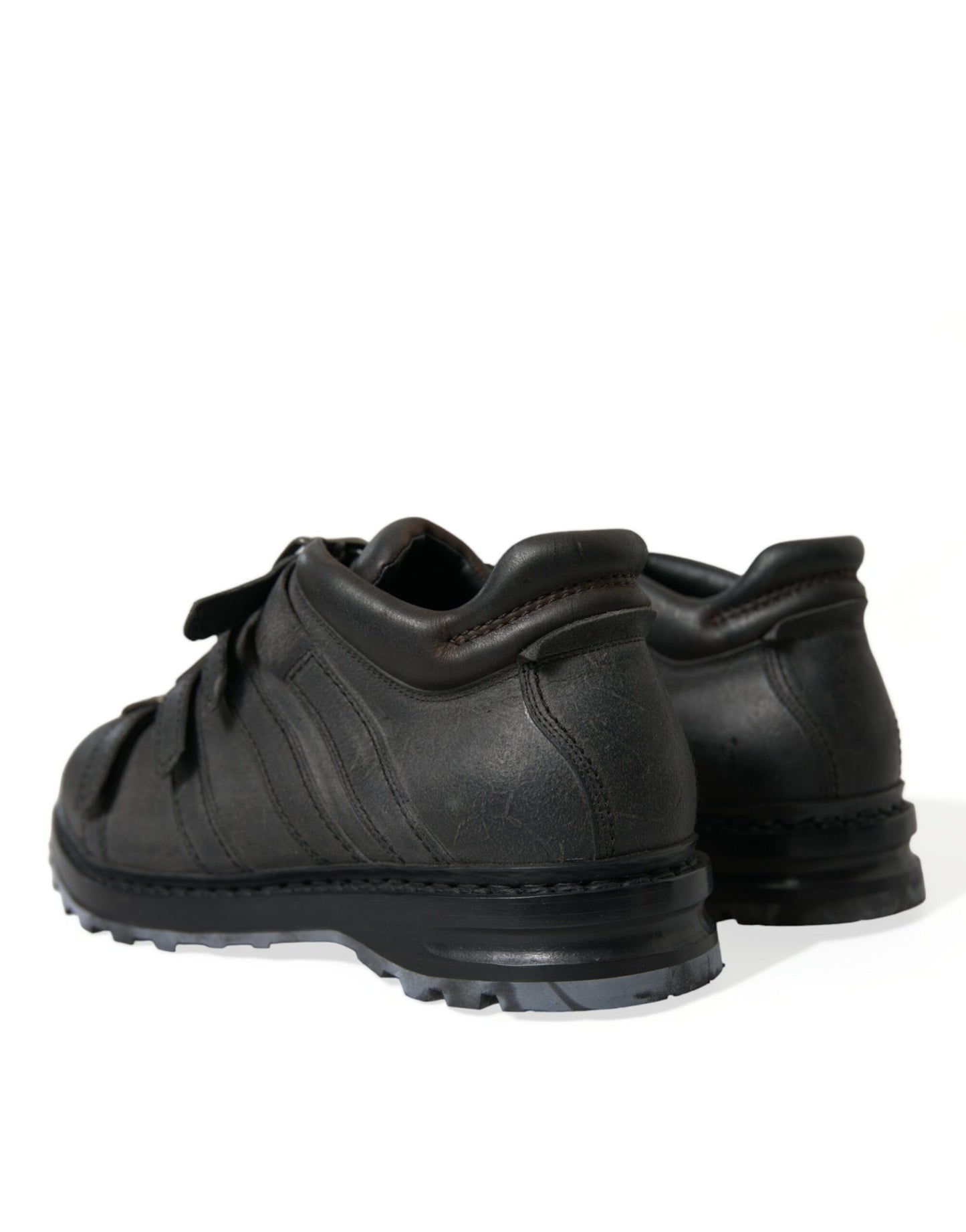 Botines negros con correa de cuero para hombre