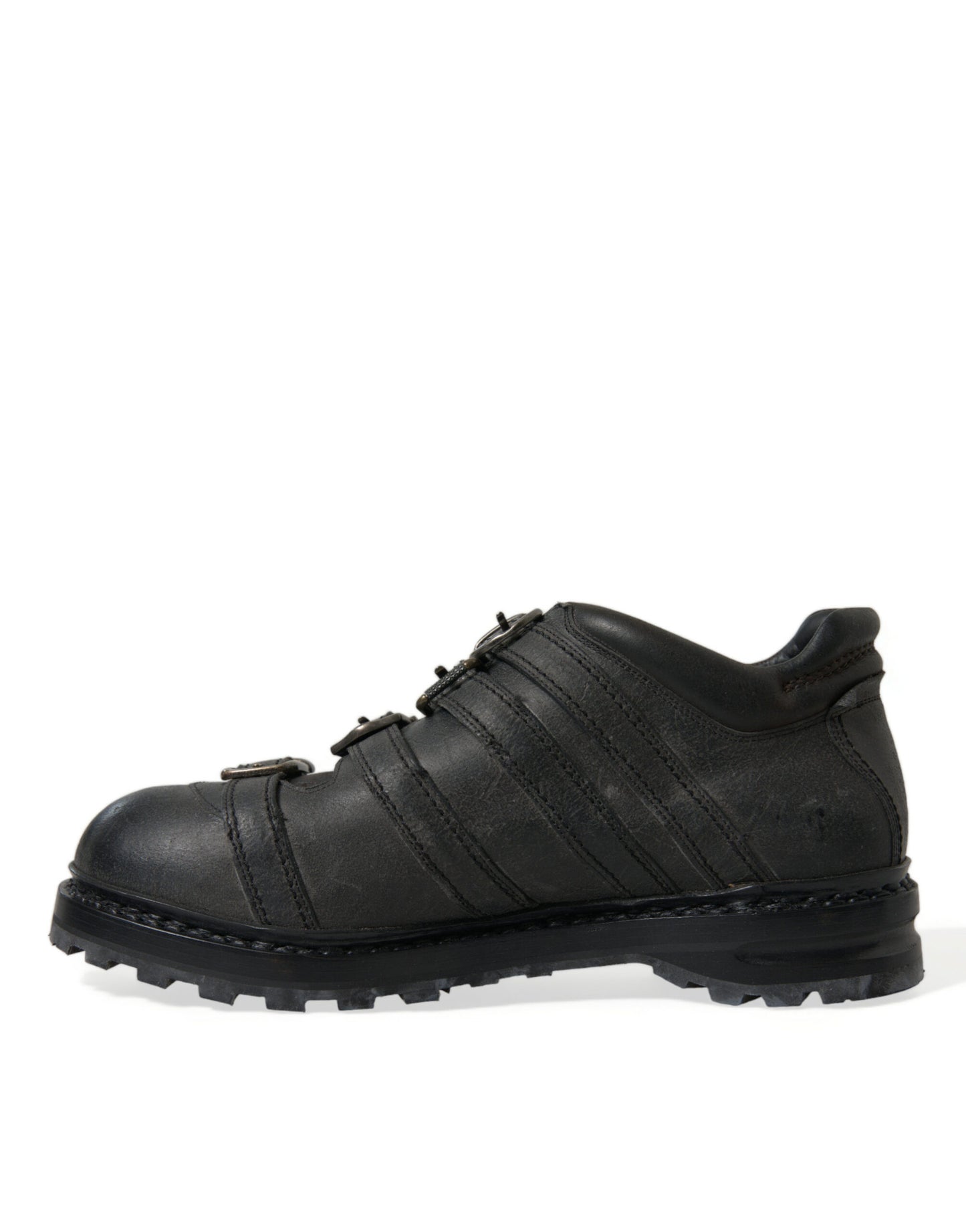 Botines negros con correa de cuero para hombre