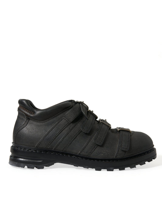 Botines negros con correa de cuero para hombre