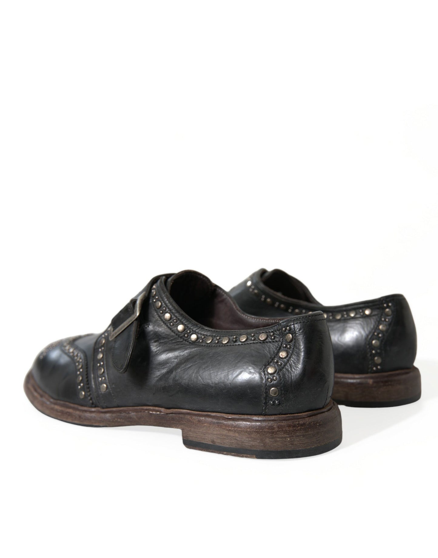 Zapatos de vestir con tachuelas y correa de monje de cuero negro