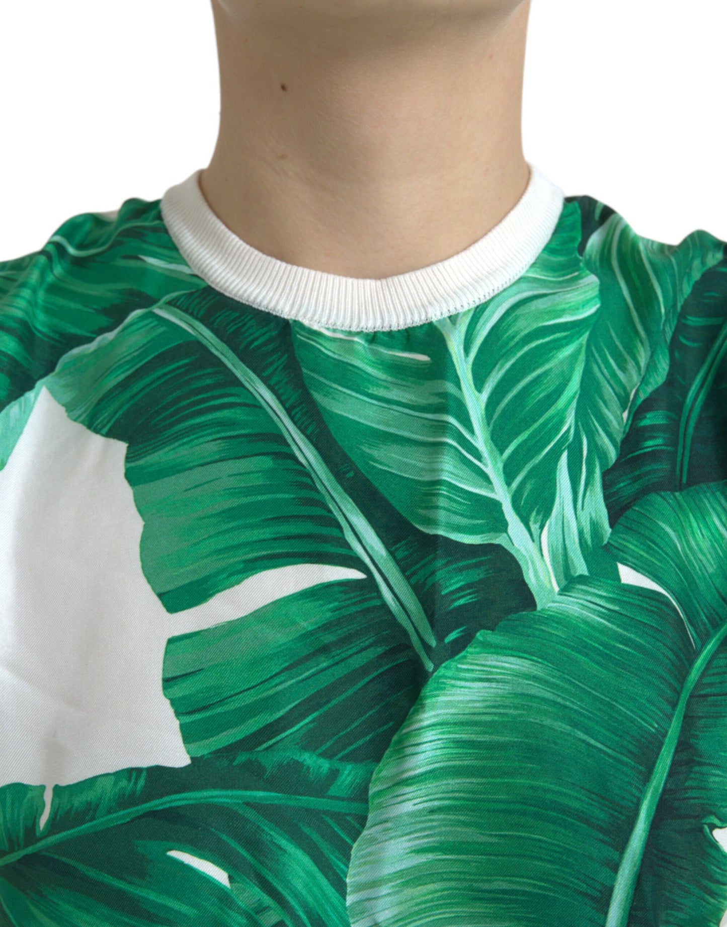 Camiseta sin mangas de cuello redondo con estampado de hojas de plátano blancas
