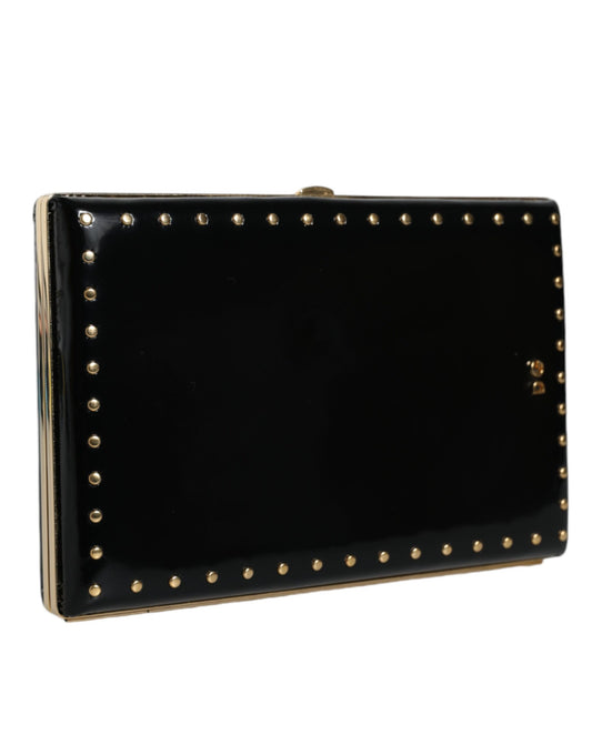 Bolso de noche tipo clutch de cuero negro con tachuelas y marco dorado