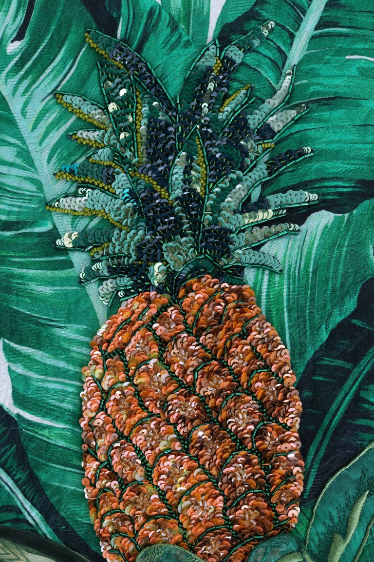 Suéter de cuello redondo con lentejuelas de piña y plátano