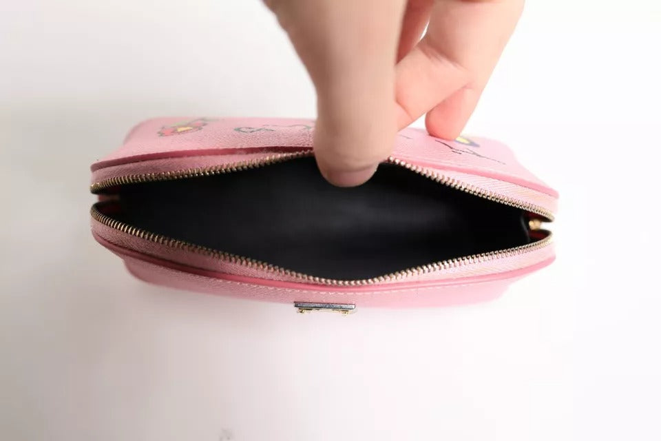 Cartera de mano con cremallera y logotipo DG en piel rosa