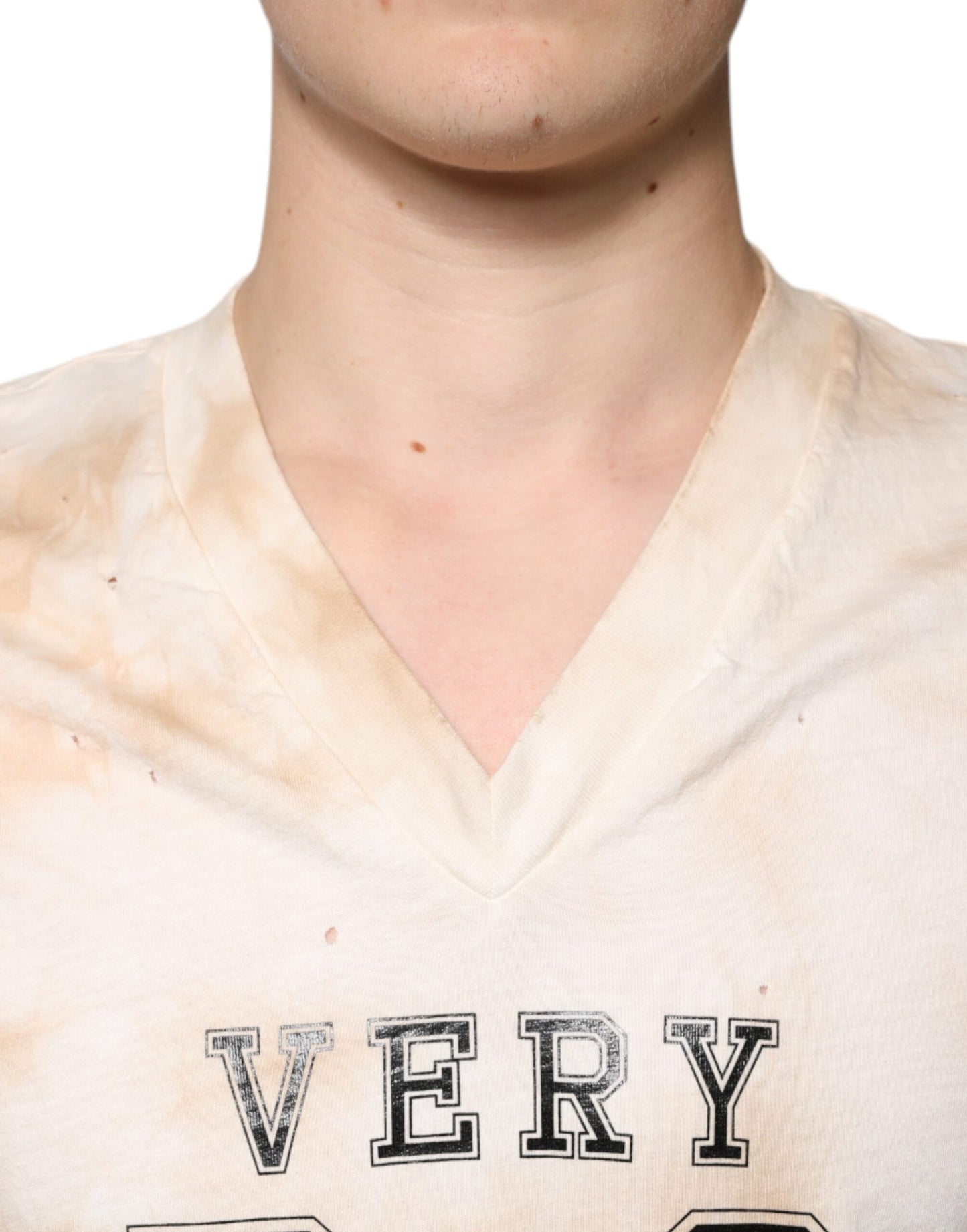 T-shirt col V en coton à imprimé graphique beige