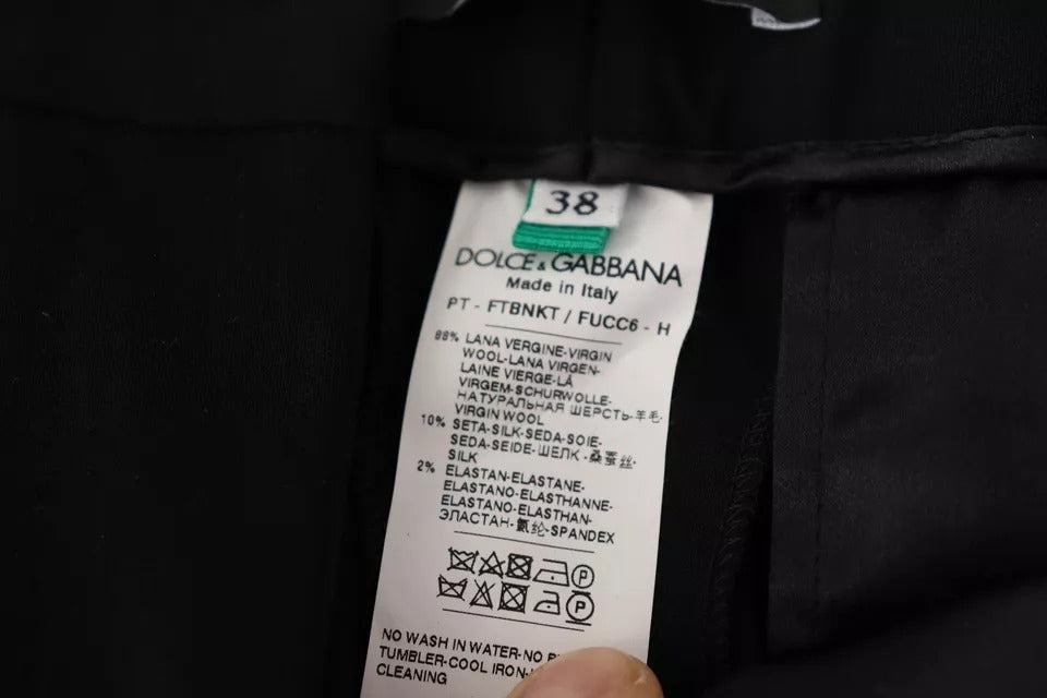 Pantalones cónicos de lana con rayas blancas y negras