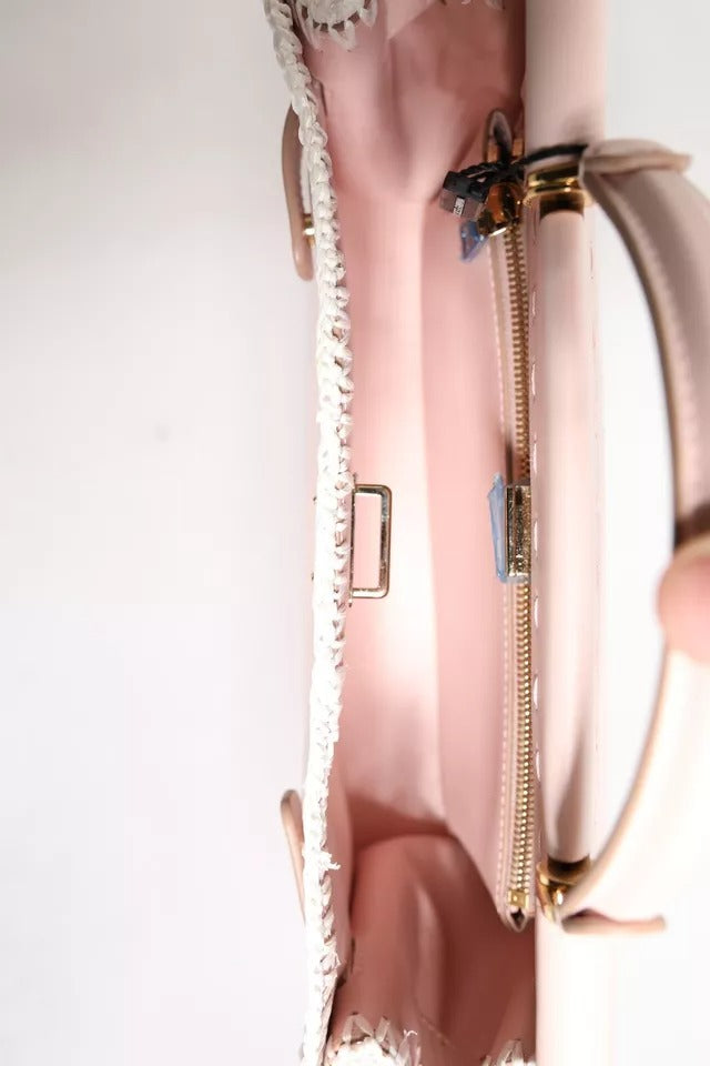 Sac bandoulière en cuir souple rose clair avec plaque logo
