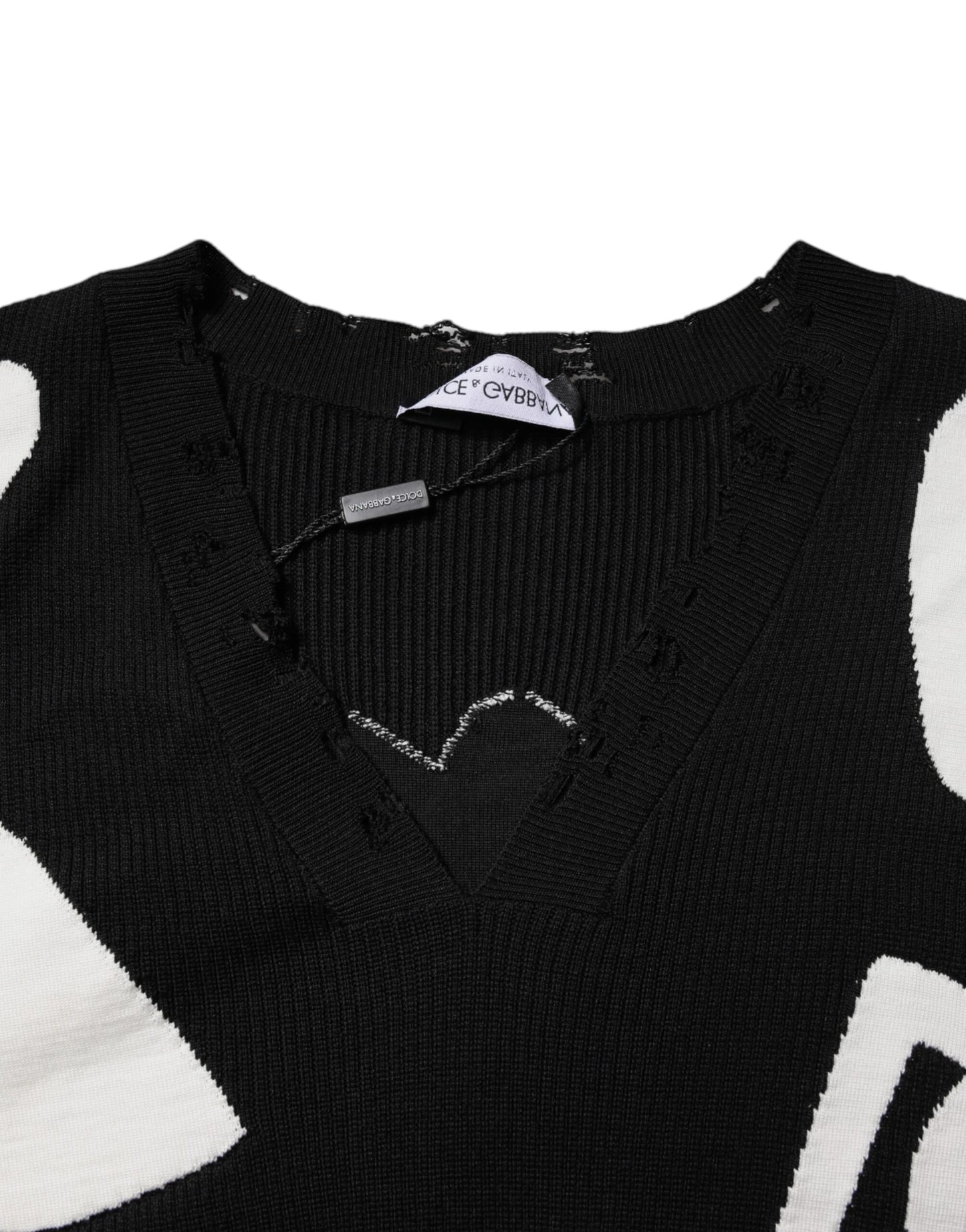 Suéter de cuello redondo de seda con corazones negros