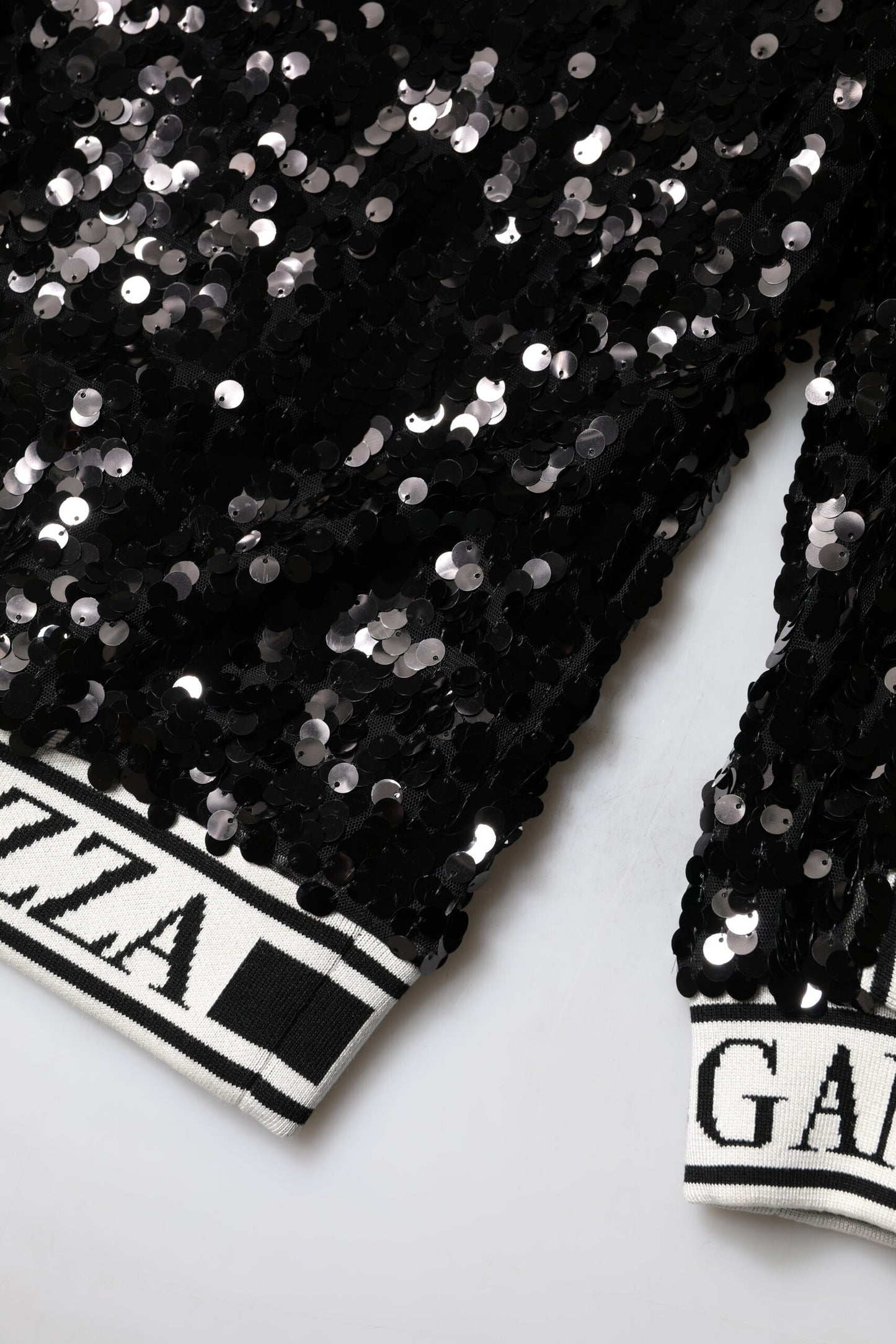 Pull à paillettes noir DG Queen