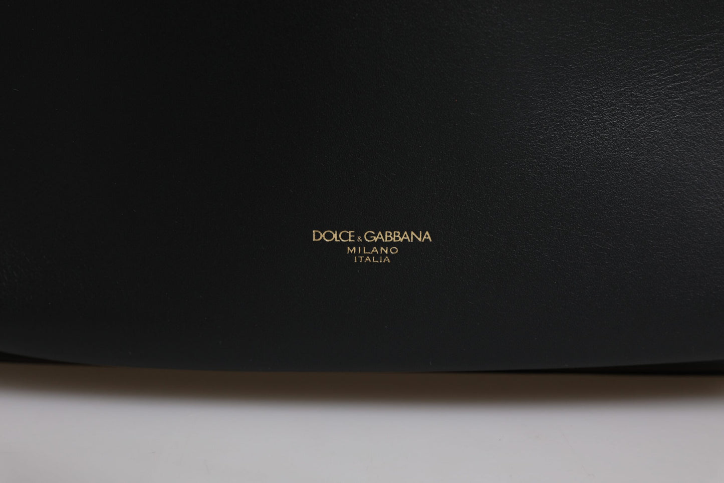 Mochila de viaje de cuero negro con estampado del logotipo de DG