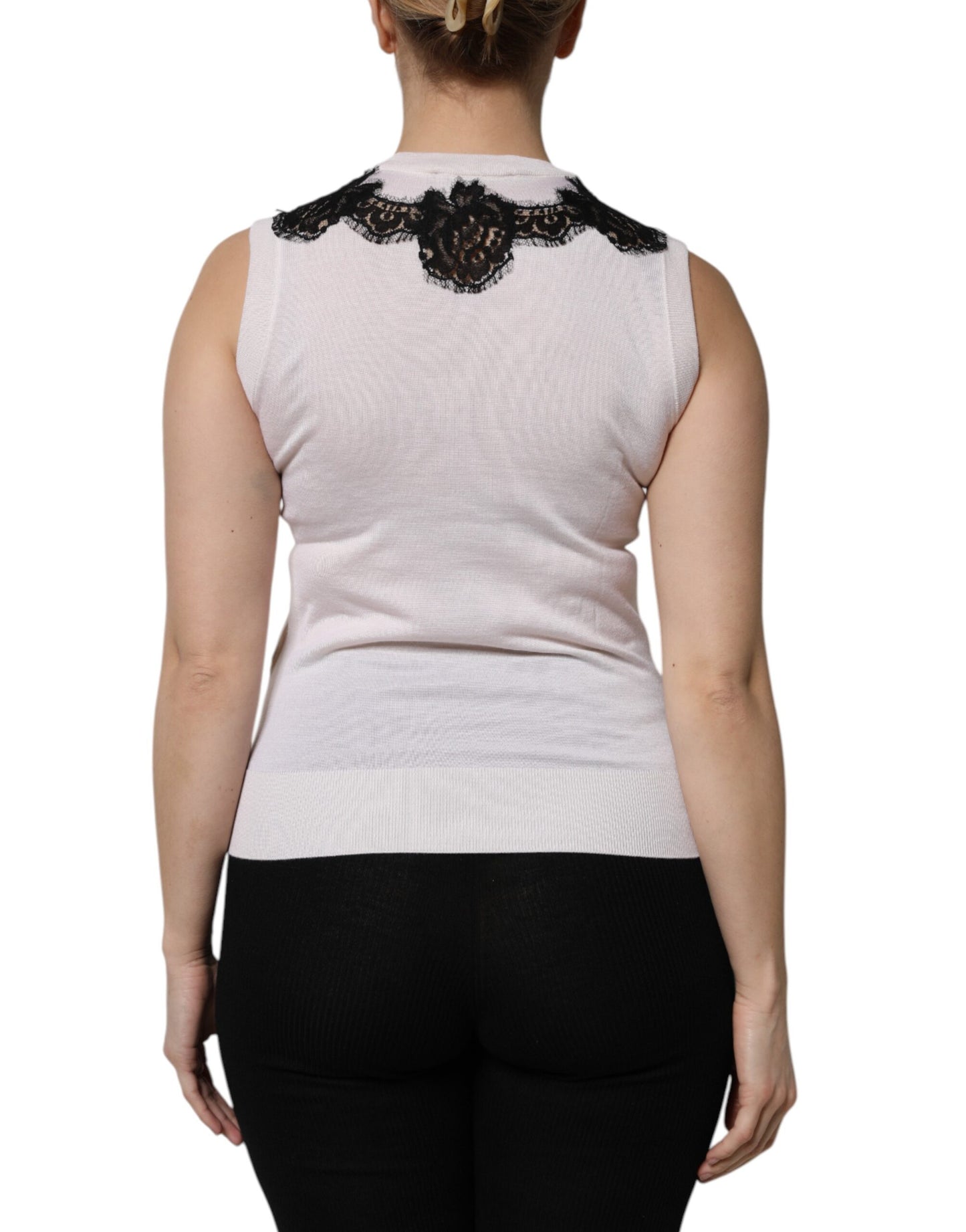 Camiseta sin mangas de cachemira blanca con detalles de encaje floral
