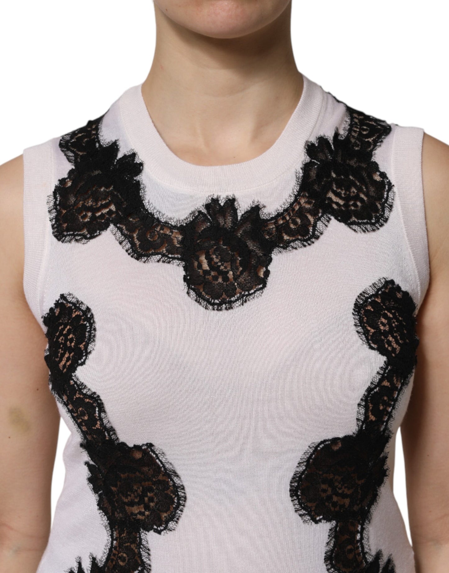 Camiseta sin mangas de cachemira blanca con detalles de encaje floral