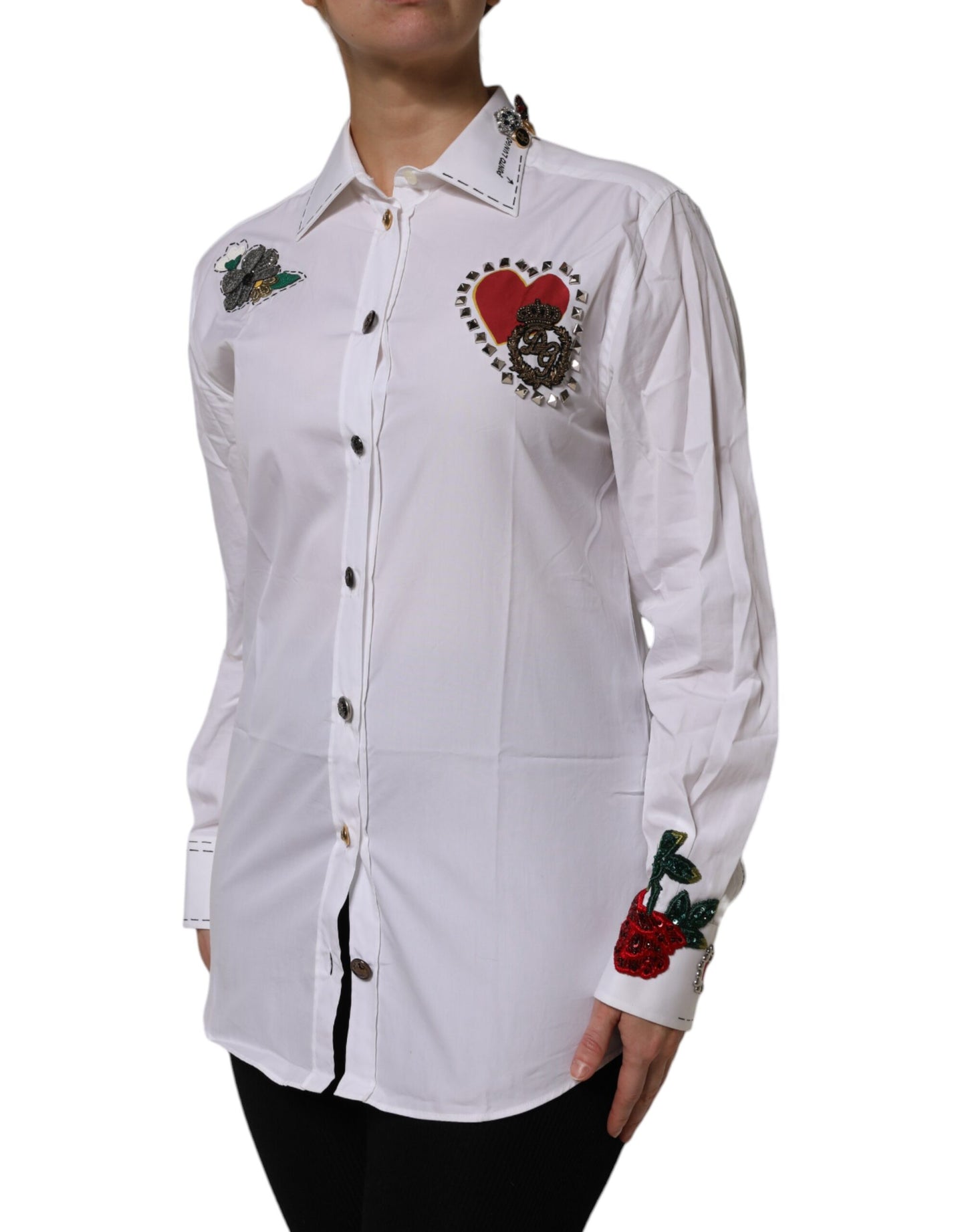 Camisa blanca de algodón con adornos florales