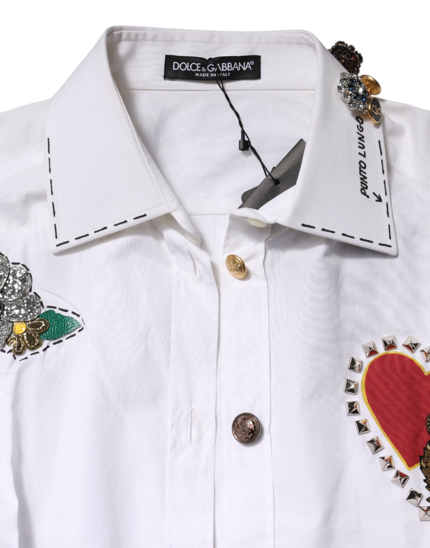 Camisa blanca de algodón con adornos florales