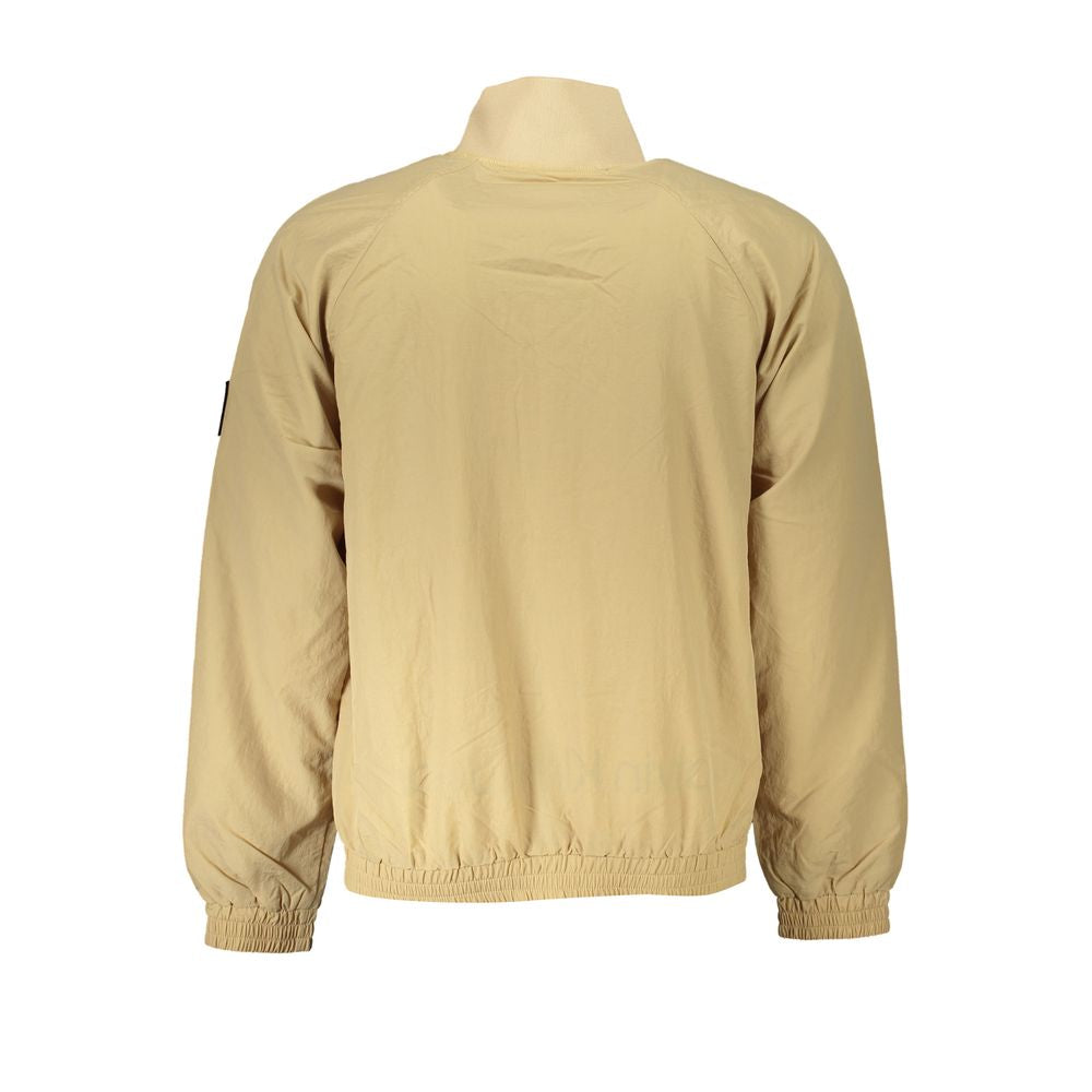 Chaqueta deportiva beige de manga larga