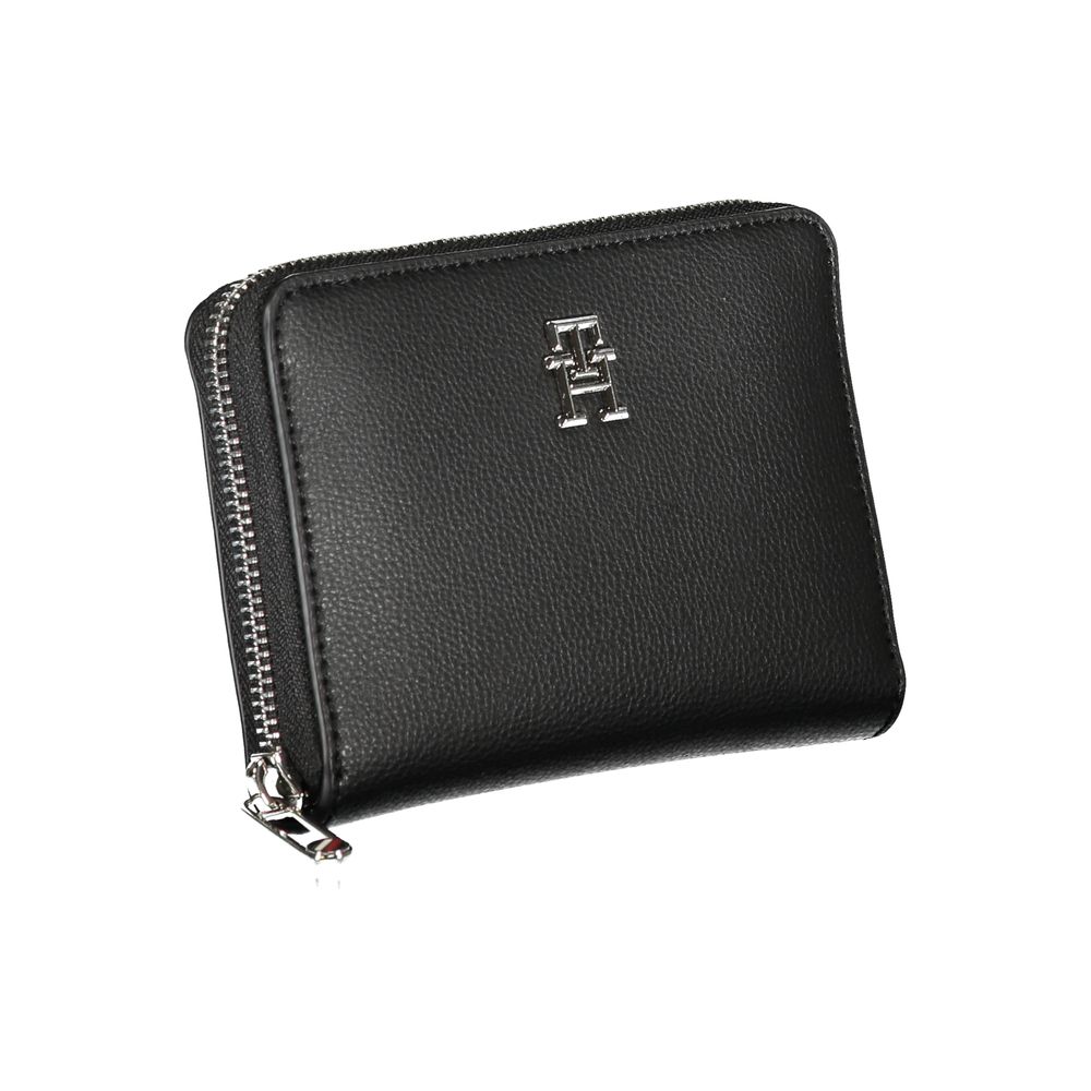 Elegante cartera negra con cremallera y múltiples compartimentos