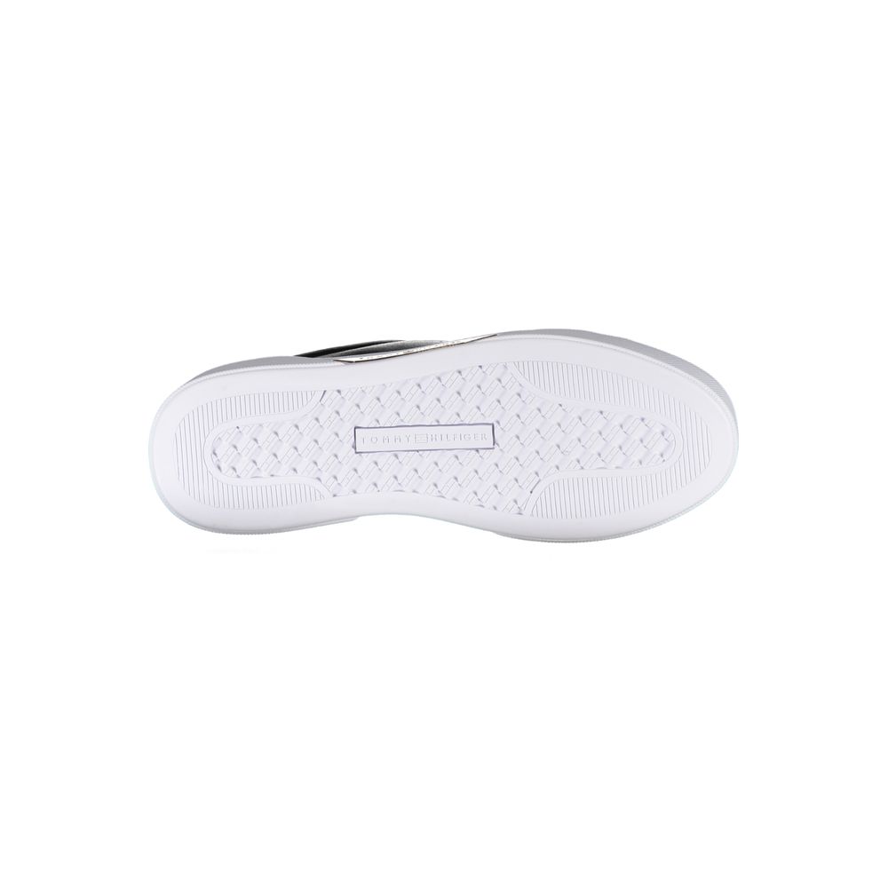 Zapatillas deportivas de piel negra para mujer