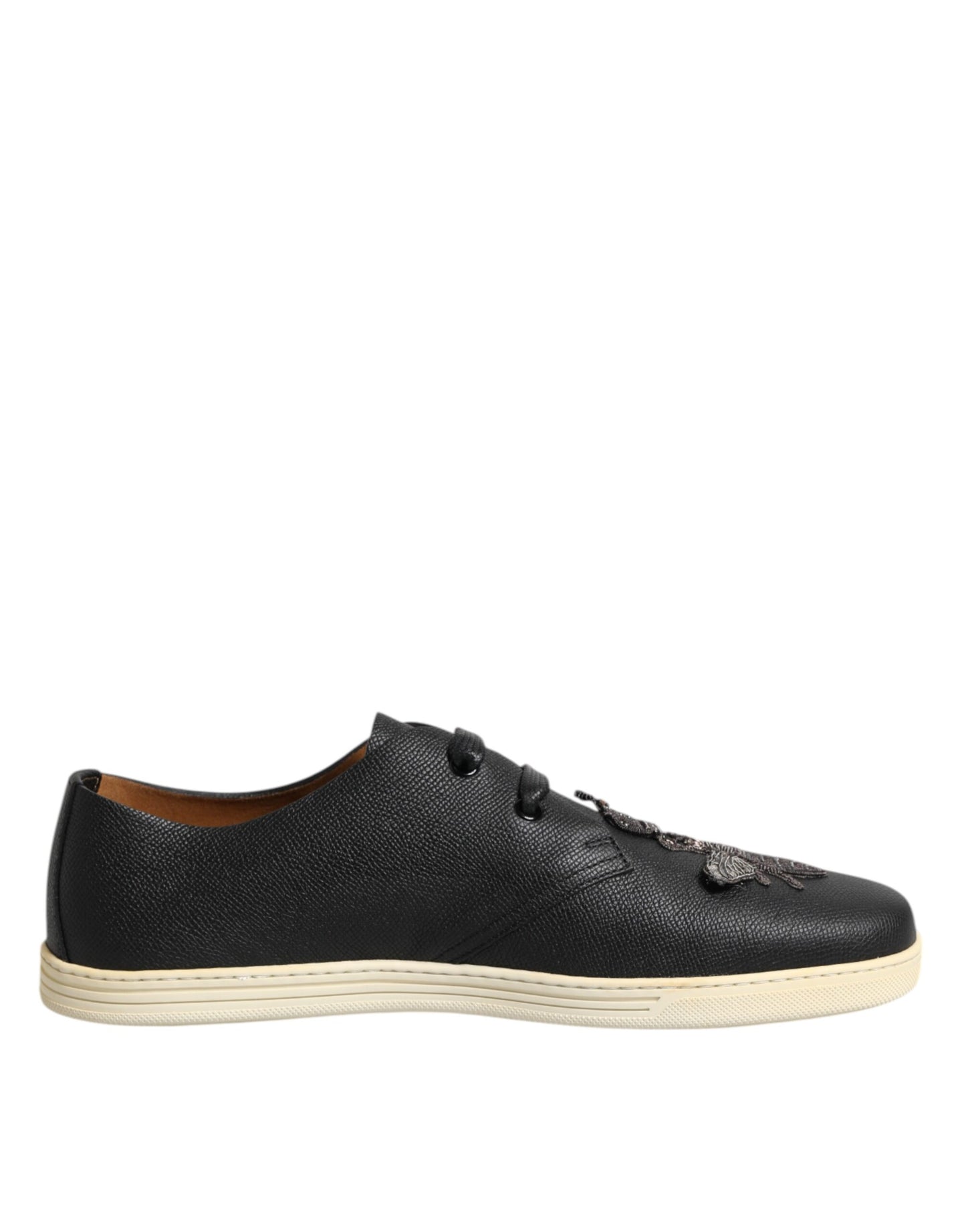 Zapatillas bajas de cuero negro con diseño de abeja y corona