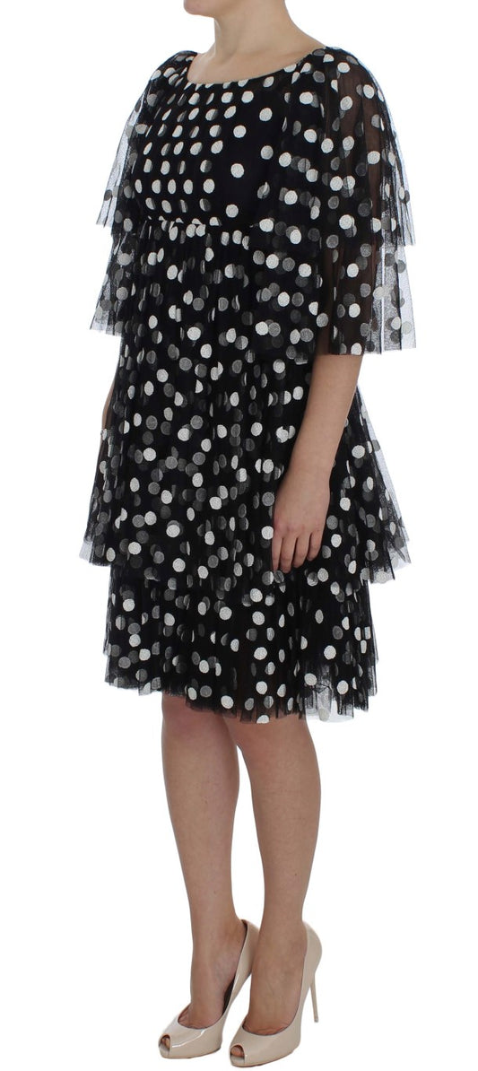 Robe à volants à pois noirs et blancs