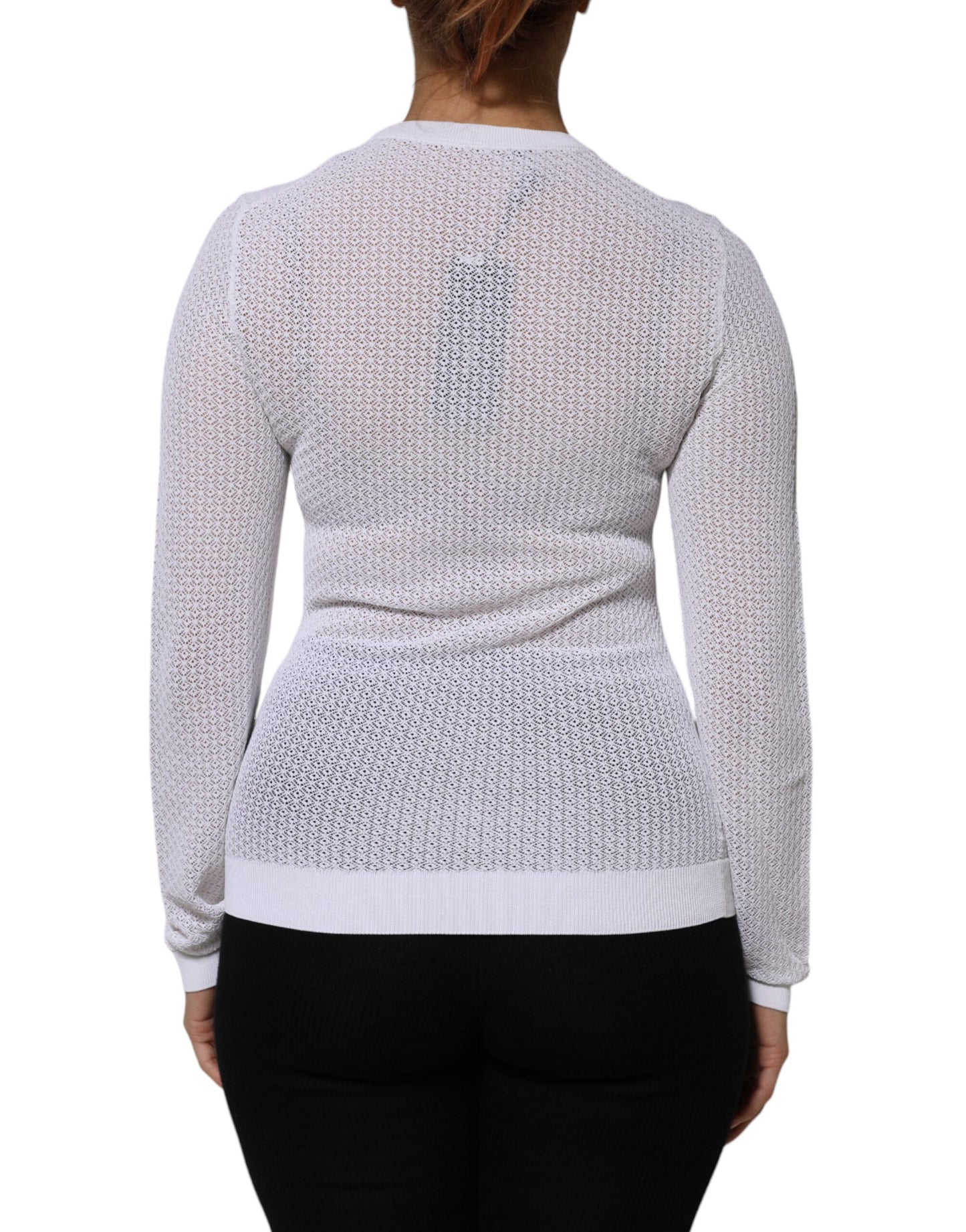 Top tipo jersey blanco de cuello redondo y manga larga