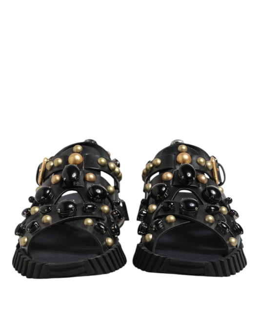 Sandalias de cuero negro con tachuelas y tiras en el tobillo