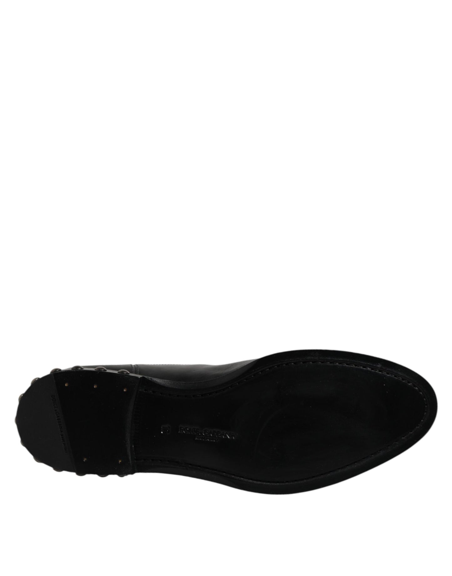 Botines de cuero negro con logo y tachuelas