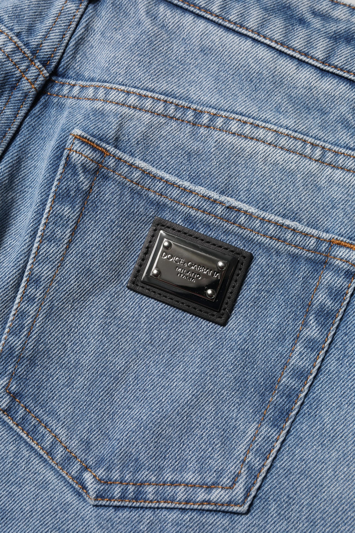 Vaqueros ajustados de cintura alta y lavados en azul