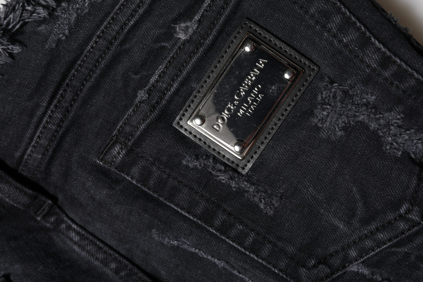 Jean skinny en coton noir déchiré