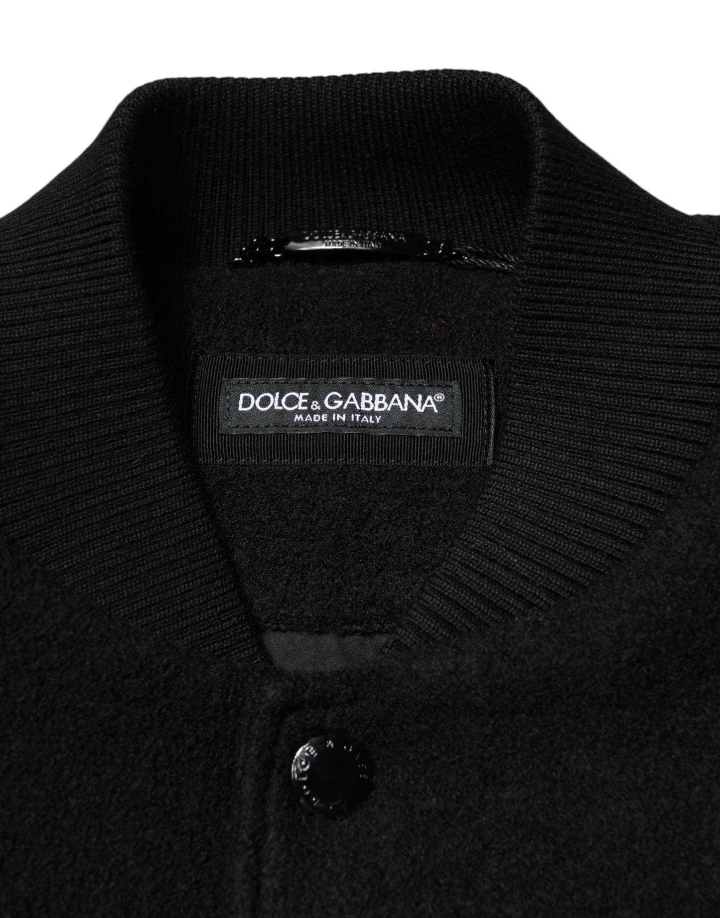 Chaqueta bomber de lana negra con placa del logotipo