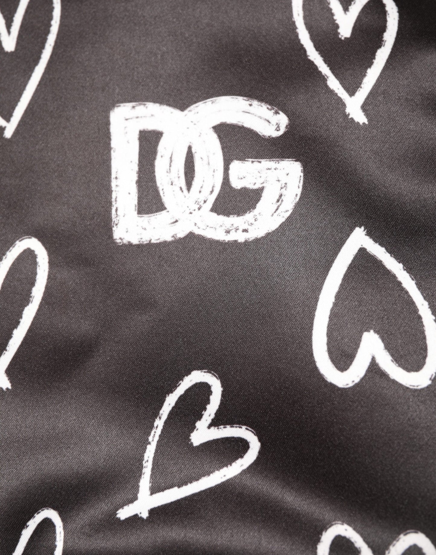 Chaqueta bomber de poliéster negra con estampado de corazones