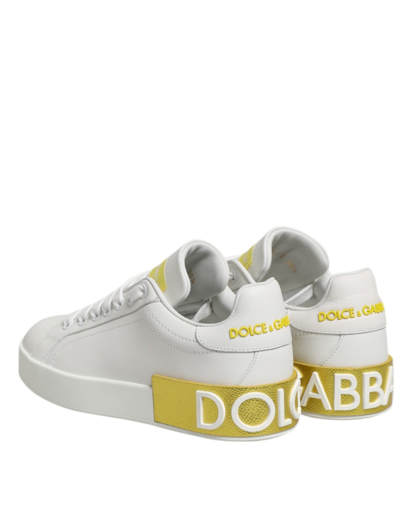 Zapatillas bajas de cuero blanco y amarillo