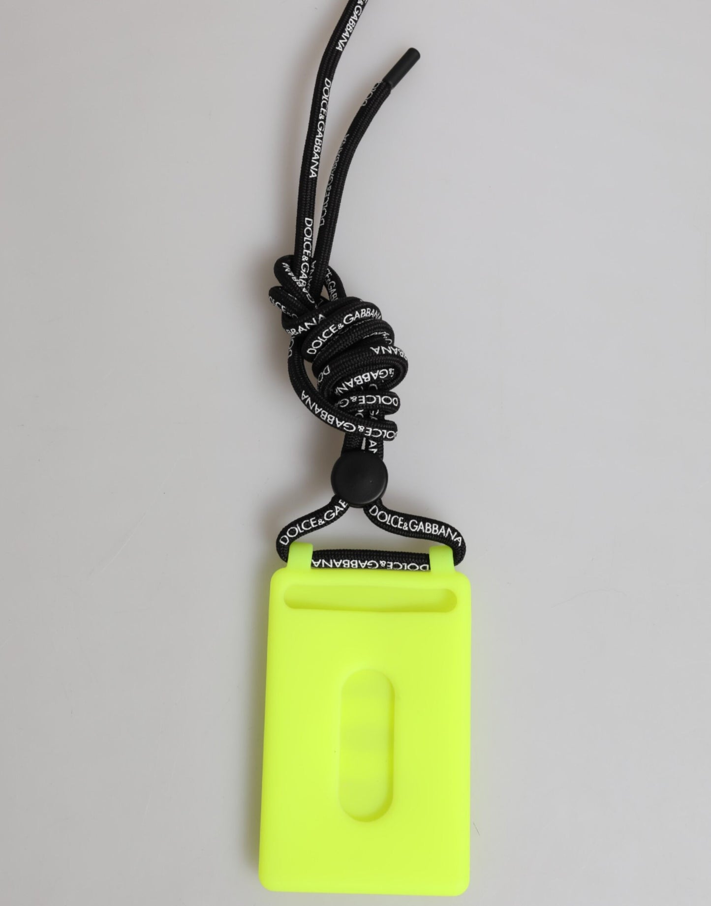 Porta credencial ajustable en relieve DG de goma verde amarillo