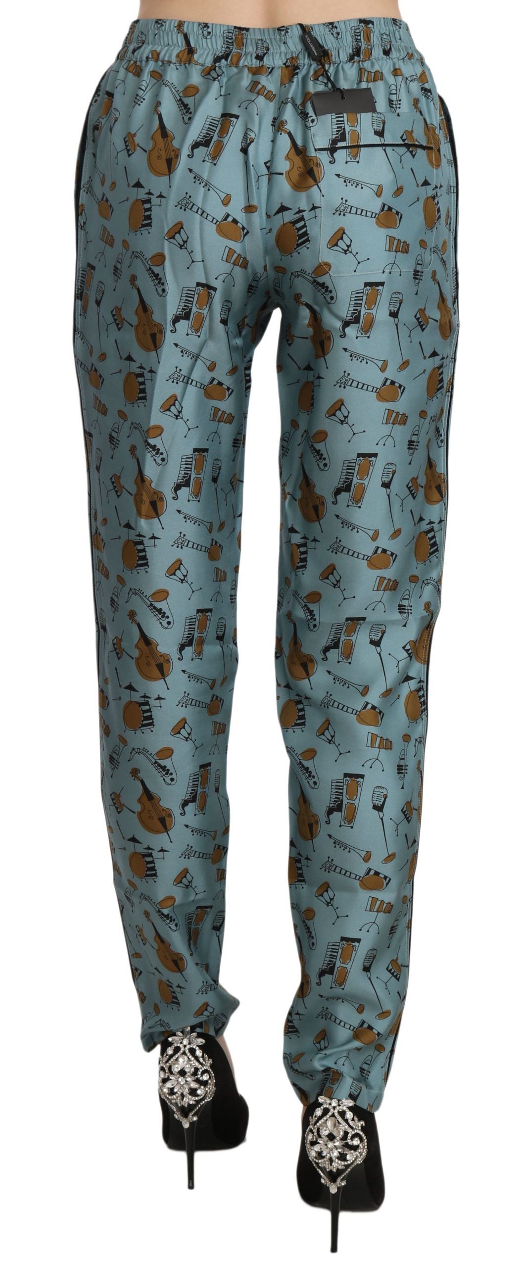 Pantalones cónicos con estampado de instrumentos musicales azules