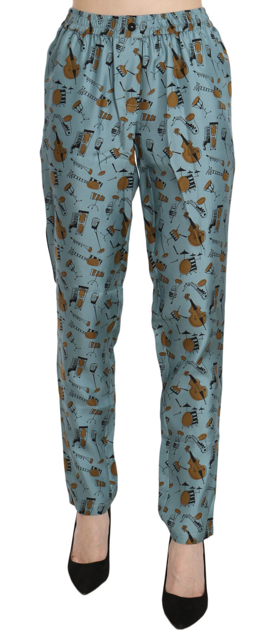 Pantalones cónicos con estampado de instrumentos musicales azules
