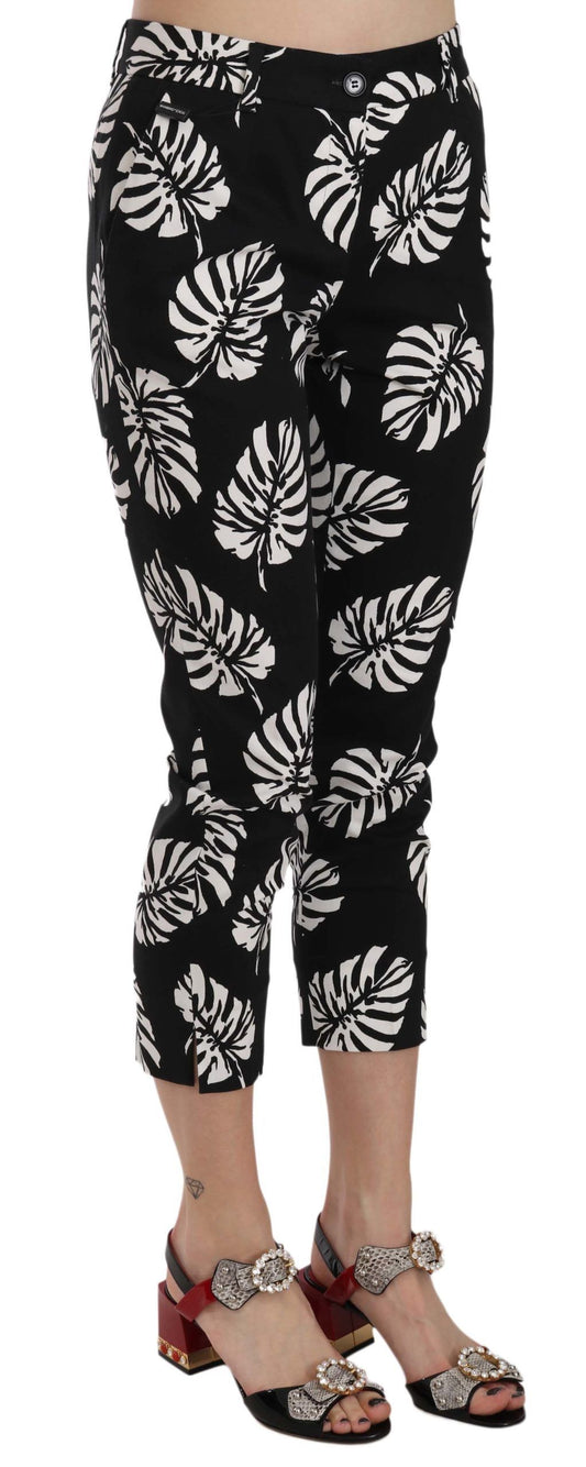 Pantalones ajustados con estampado de hojas de palma negras