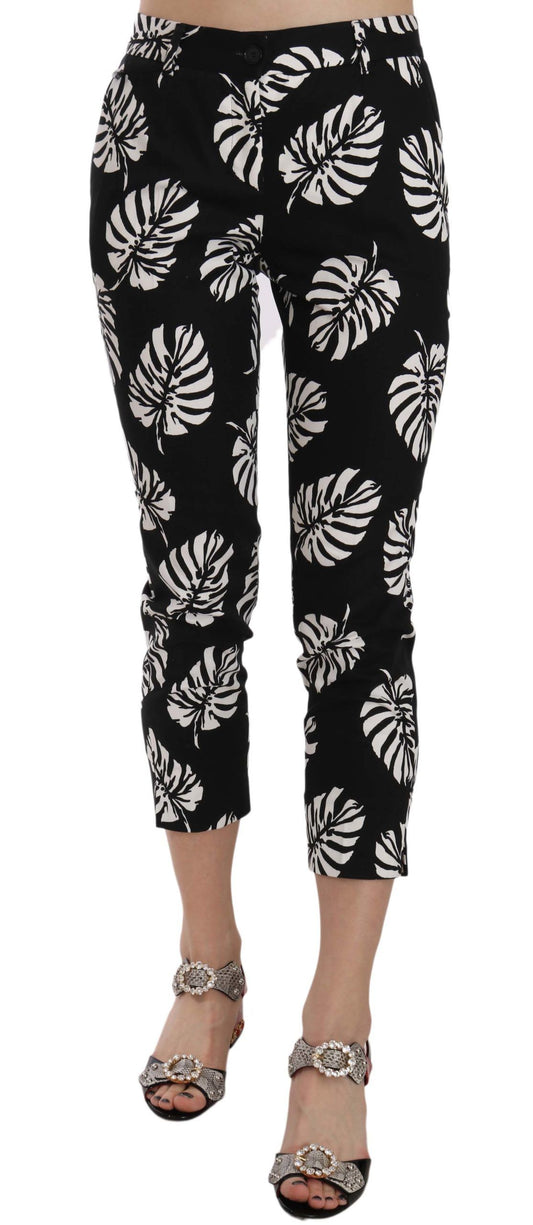 Pantalones ajustados con estampado de hojas de palma negras