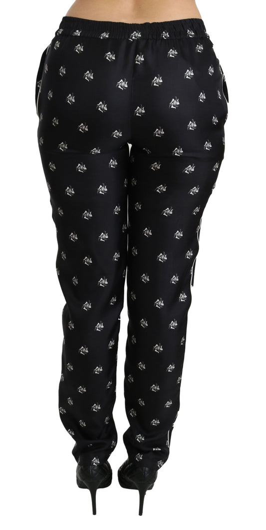 Pantalones ajustados de seda con cintura media y estampado negro