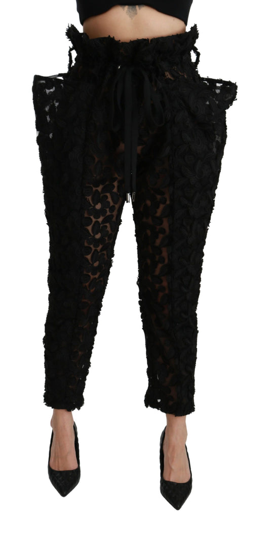 Pantalones negros de cintura alta con encaje floral y diseño cónico