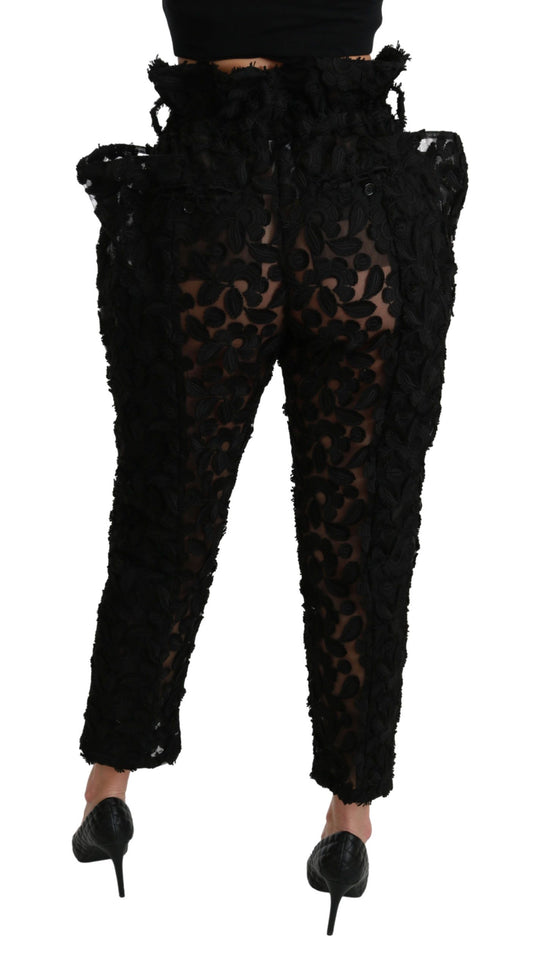 Pantalones negros de cintura alta con encaje floral y diseño cónico