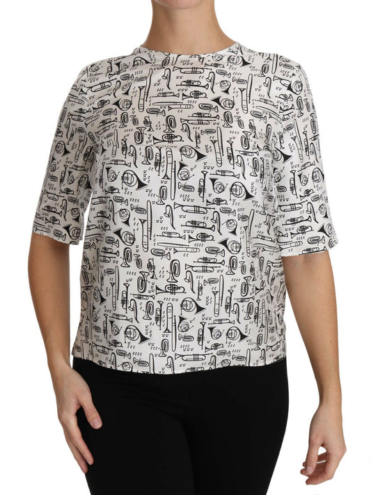Blusa blanca con estampado de instrumentos musicales