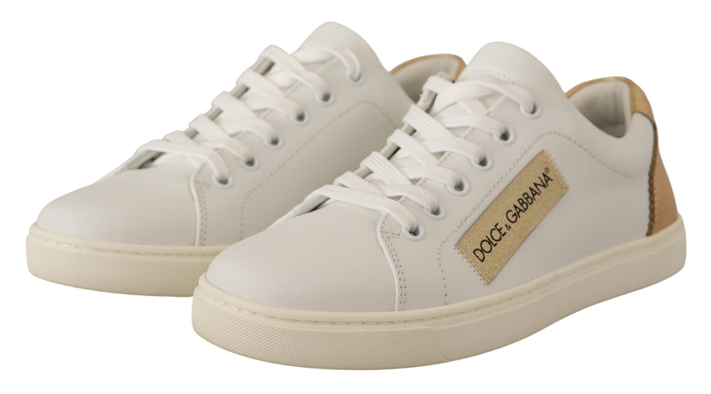 Baskets basses en cuir blanc doré